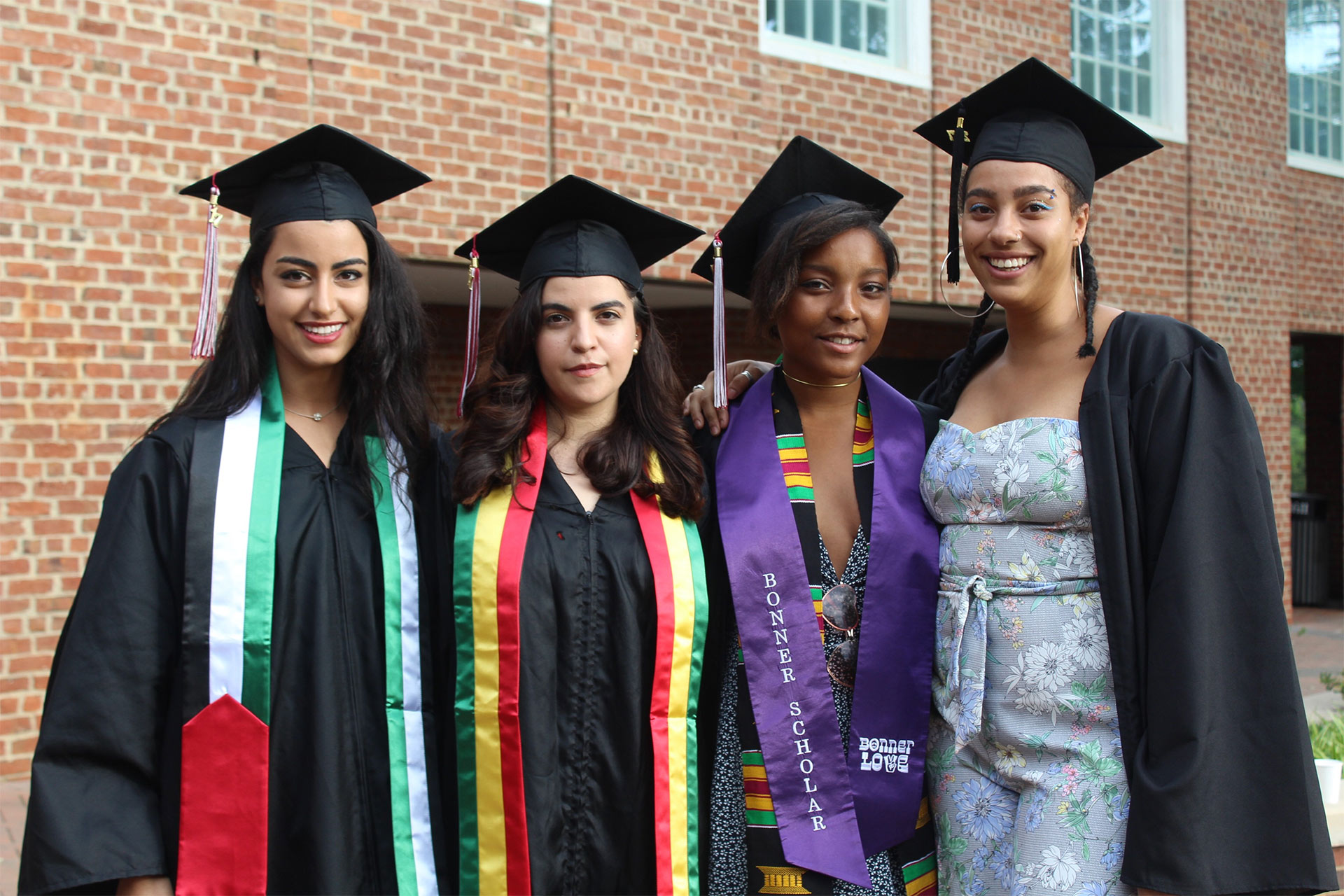 Grads snag an opportunity to take a photo together before Commencement.