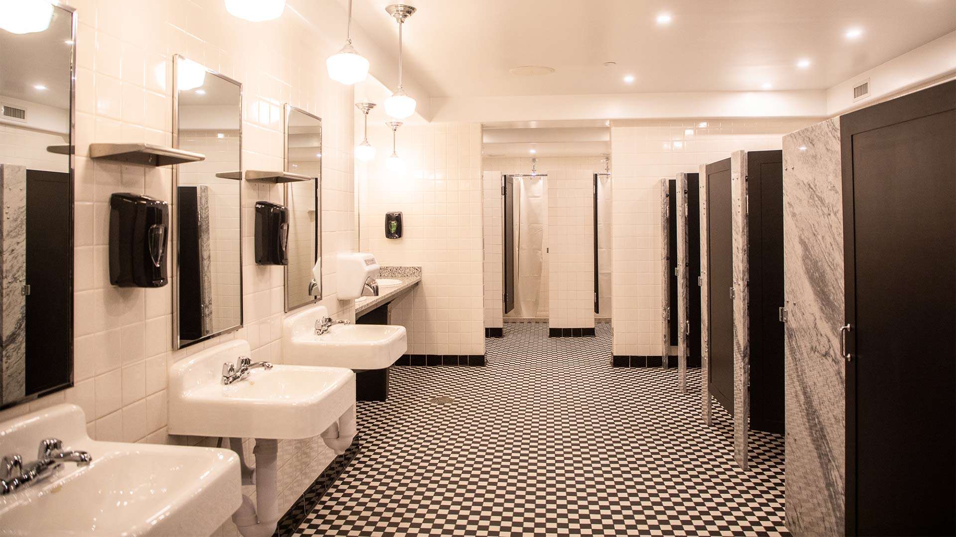 Bathrooms were updated with higher ceilings, durable materials, such as marble, granite and terrazzo, as well as newly designed private bathing and dressing areas.