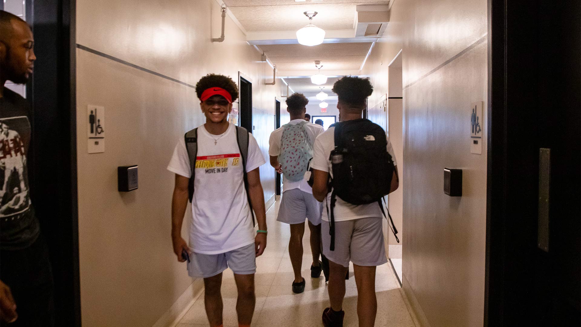 Orientation Leaders help students move in to Binford Hall.