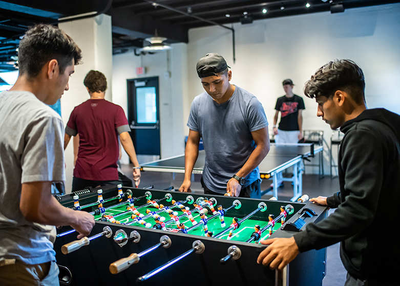 Students playing games in Milner Hall