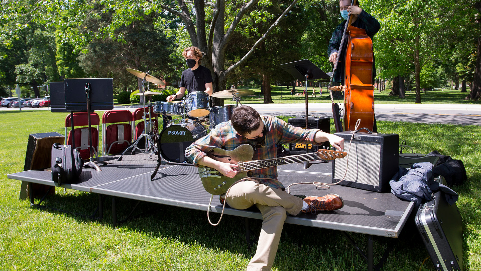 The Guilford College Jazz Ensemble warms up on the Quad.