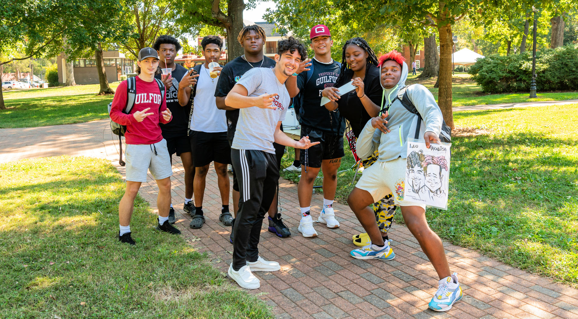 Eight Guilfordians pose for a photo on the Quad.