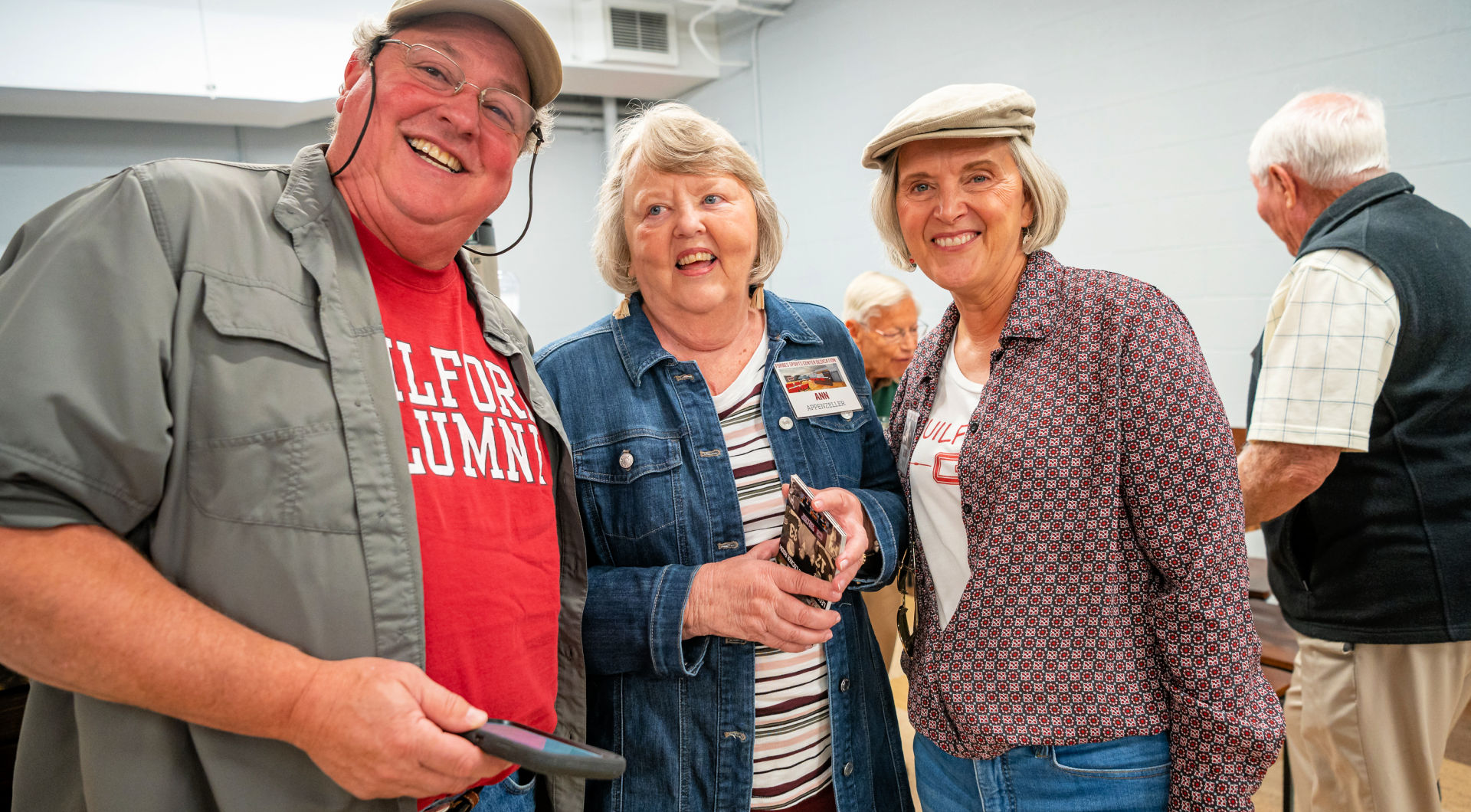 Three Guilfordians smile for a quick photo.