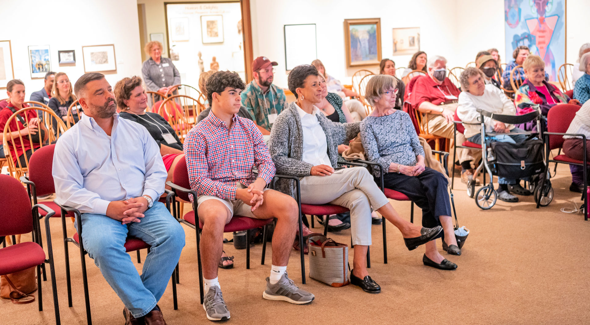 Guilfordians fill the seats for a homecoming event in the Art Gallery.