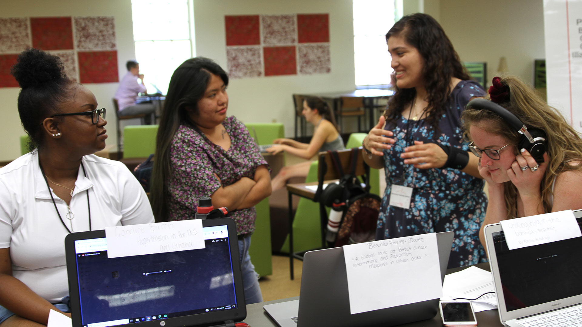 Students listen to podcasts at GUS.