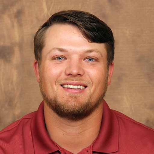 Jacob Cutshall in a burgundy shirt